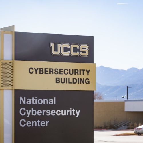 entrance sign to the Cybersecurity Building at UCCS